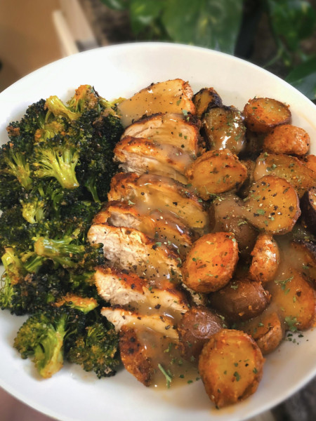 Chicken breast, mini garlic butter potatoes, and roasted broccoli