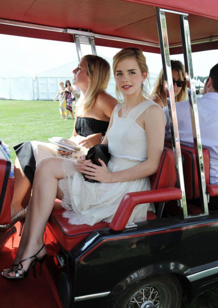 Emma in a golf cart