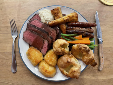 Roast beef with roast potatoes, Yorkshire puddings and honey parsnips