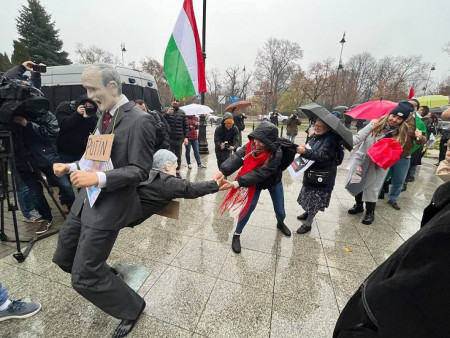 Hungarian ambassy in Poland. People trying to pull Orban from Putins ass