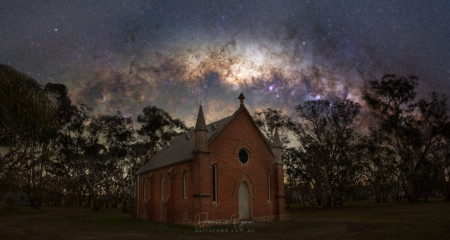 Milky way core sets over an old rural church, Australia