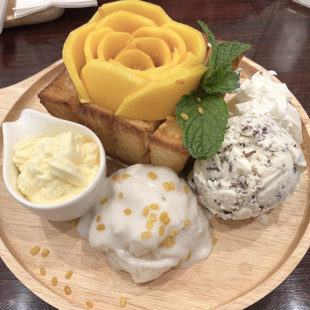 Mango sticky rice with coconut ice cream, mango creme, and crispy loft toast