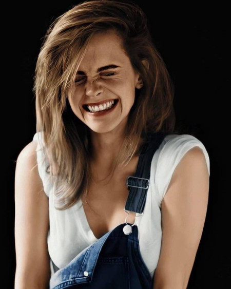 Emma in overalls