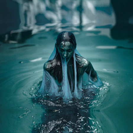 Picture of a woman wearing silk in a pool