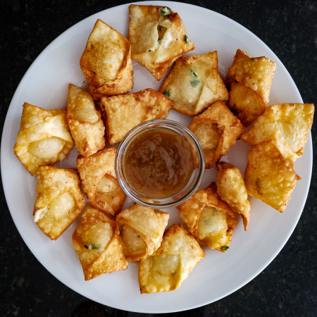 Homemade crab, cream cheese and chive wontons