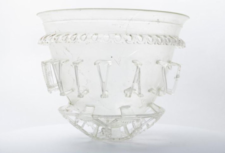 A rare, priceless Roman glass vessel known as a cage cup that was discovered in a cemetery in France has been conserved and restored