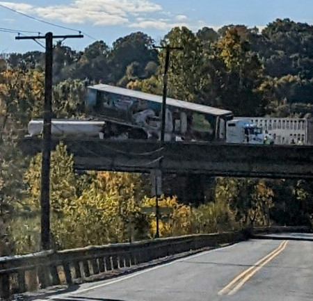 Not a trick of perspective, that&#039;s a tanker truck under a semi