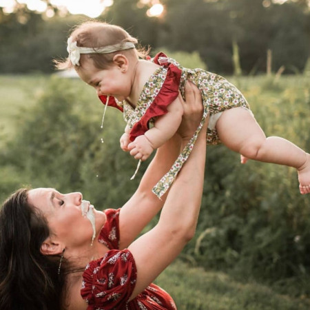 Let&#039;s get a nice shot of Mom holding up the baby