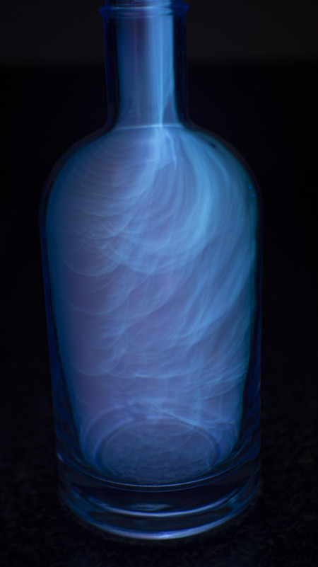 4 second exposure of alcohol vapor burning in a bottle