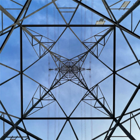 The symmetry of this high tension electric tower, viewed from underneath