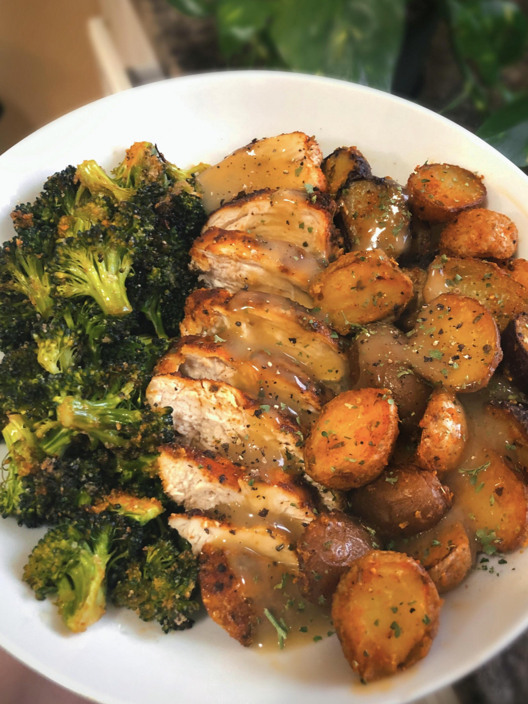 Chicken breast, mini garlic butter potatoes, and roasted broccoli