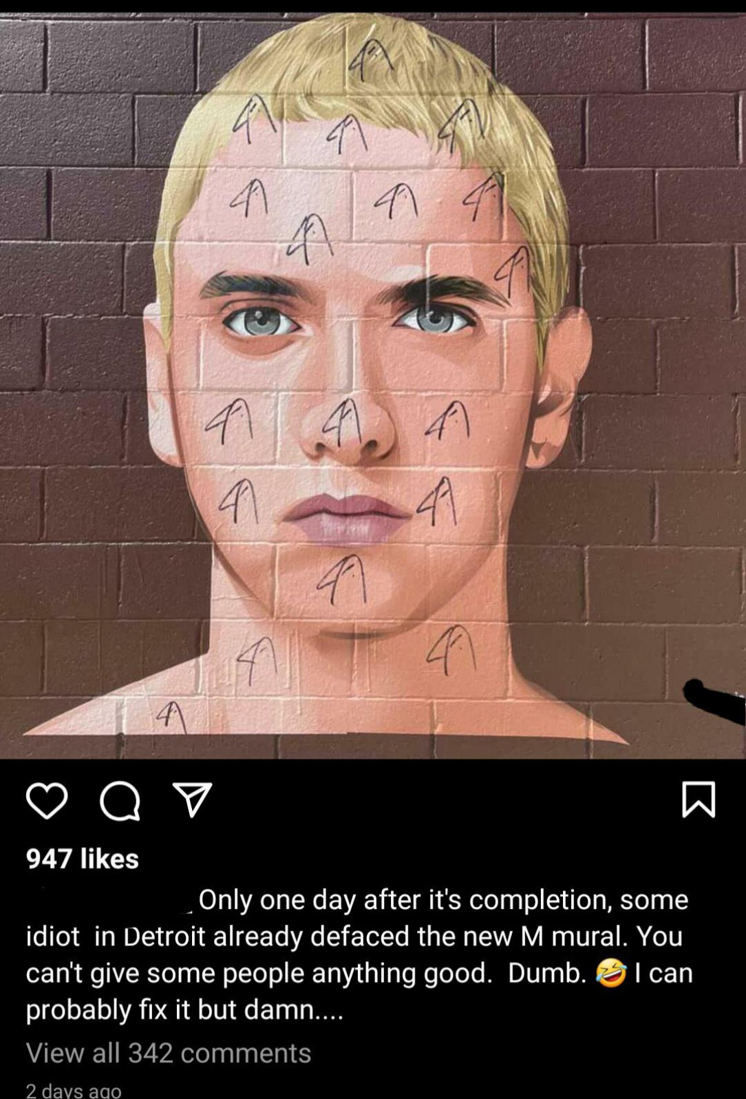 Someone vandalized a Detroit mural of Eminem less than 24 hours after it was finished