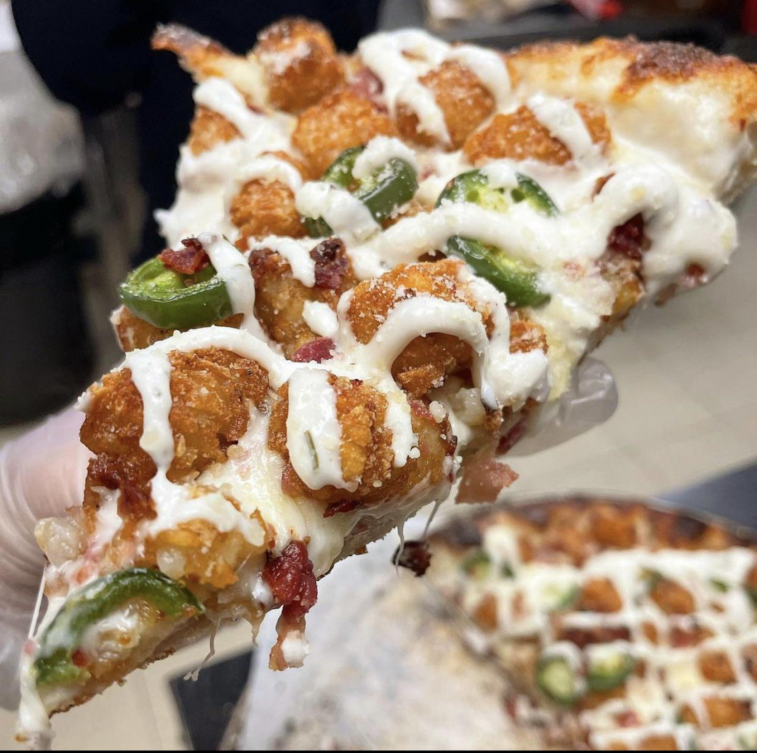 Queso, tots, jalapeños, bacon, and ranch