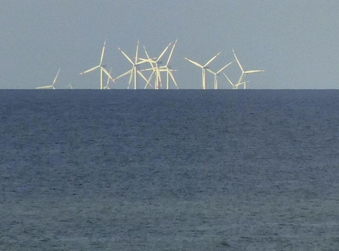 Turbines below the horizon. This should shut the flat earthers up for good