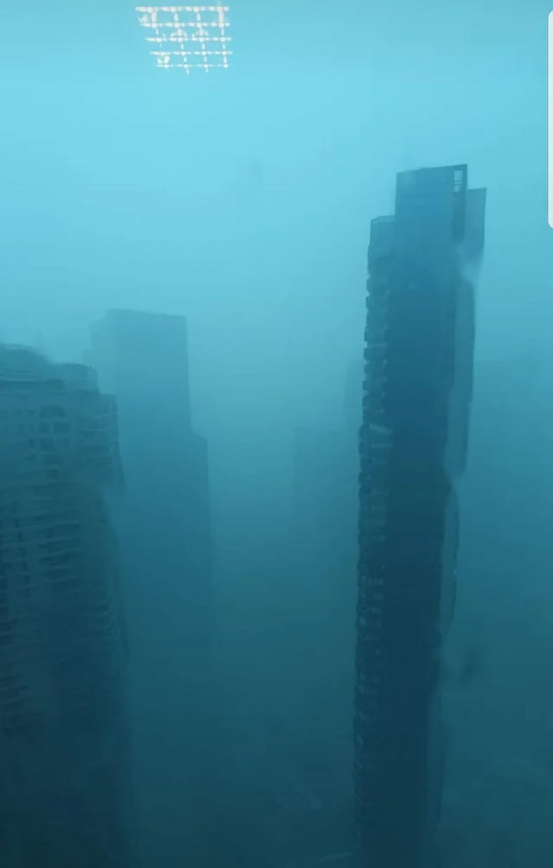 The view from an apartment building during a rainstorm