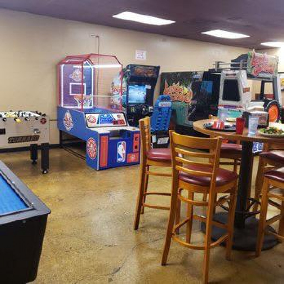 The local pizza place arcade/game room