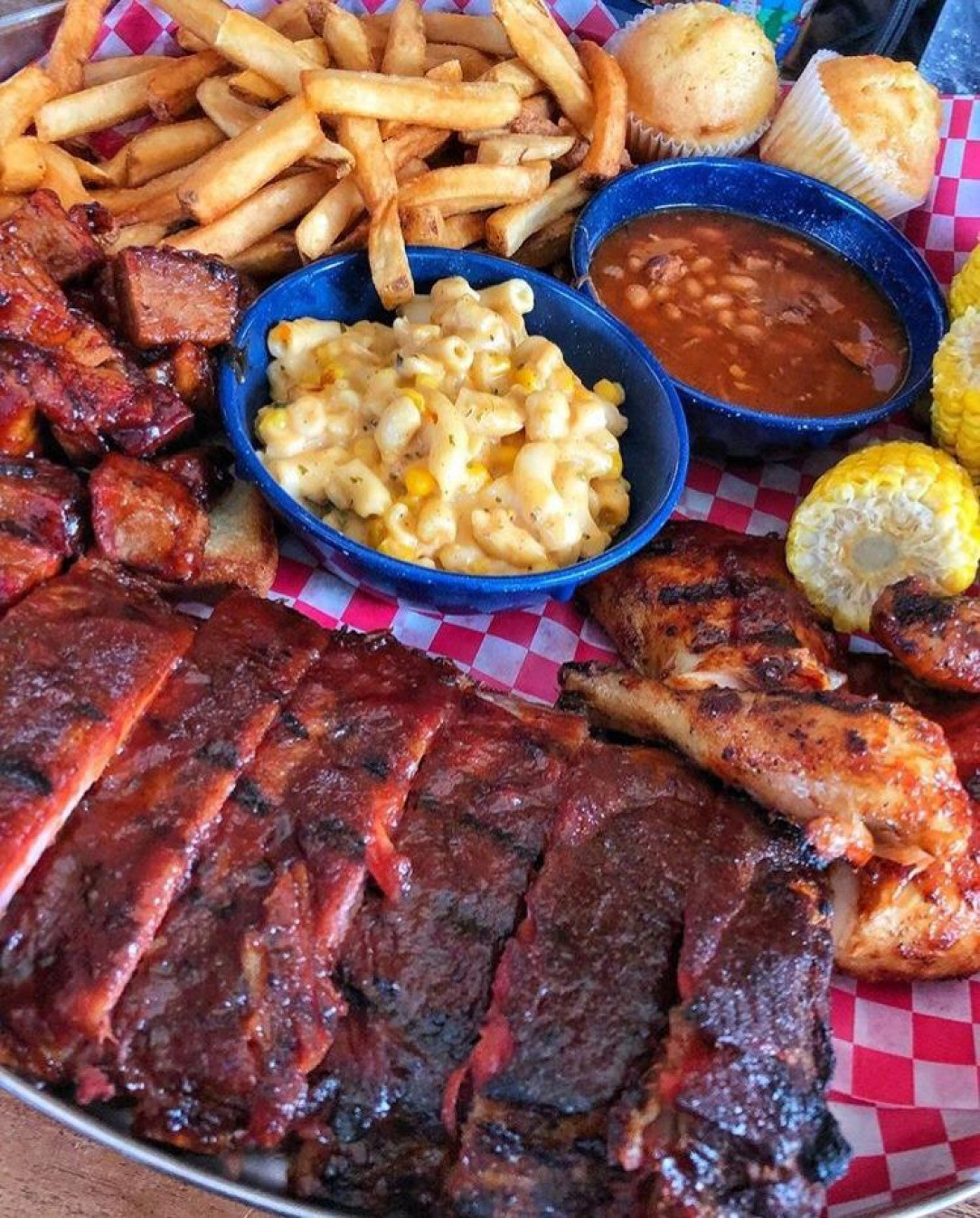 Ribs chicken fries beans mac and cheese