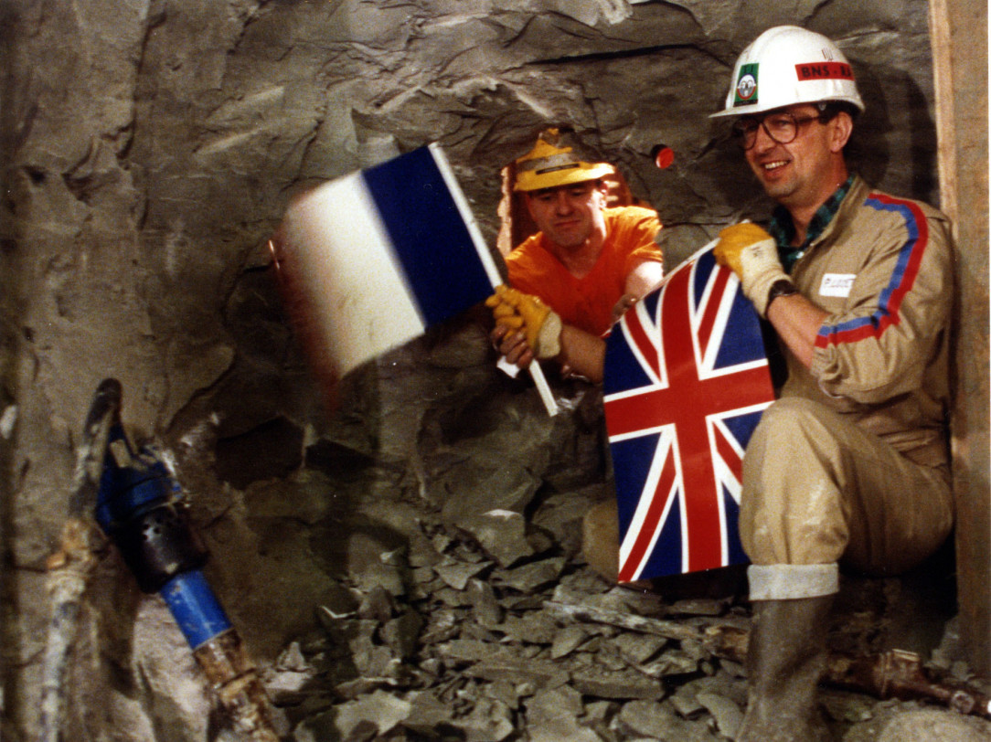 Engineers from the UK and France meet during the construction of the channel tunnel, 1990