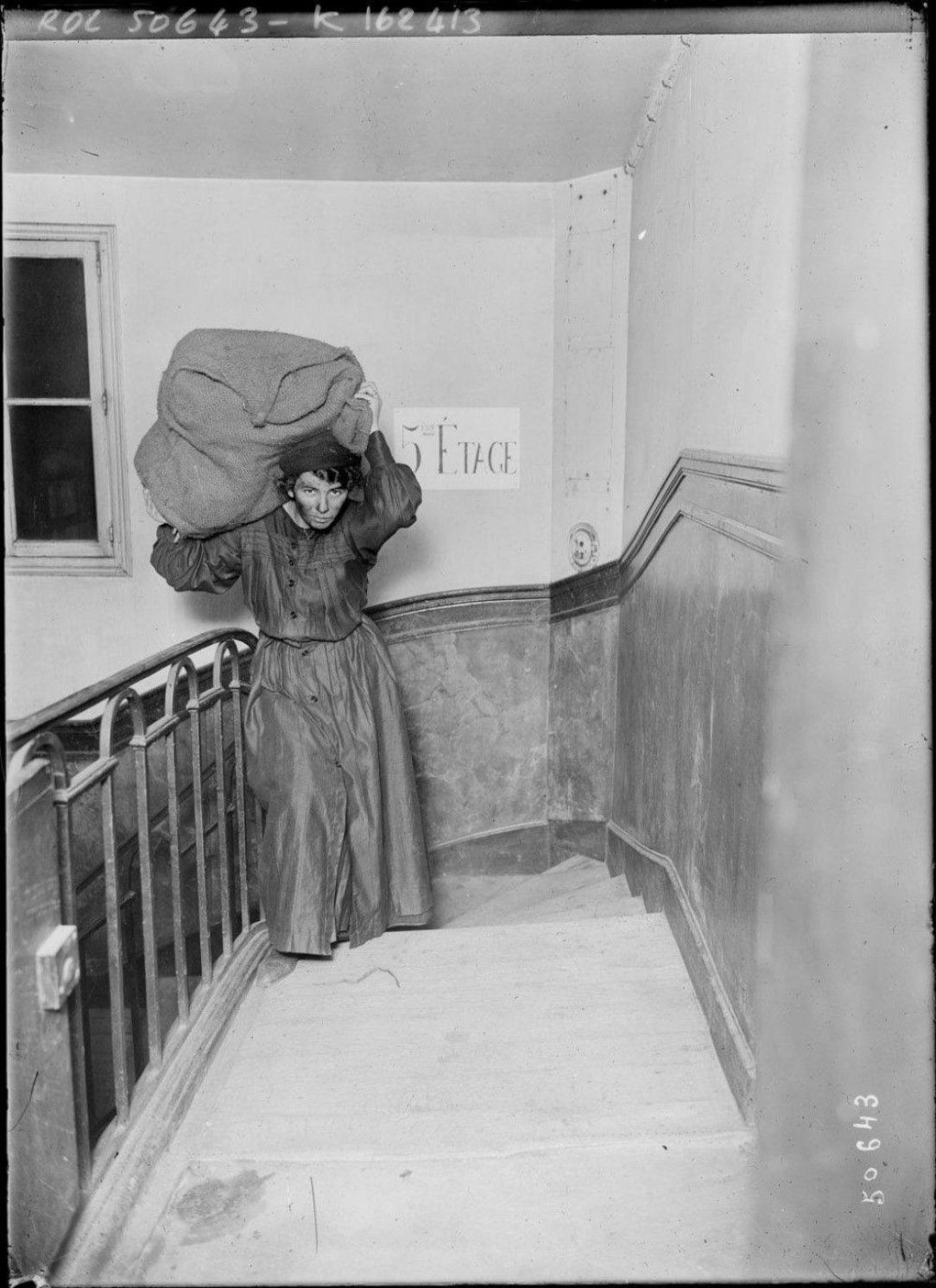 A woman delivers coal in France during WWI, 1914-1918