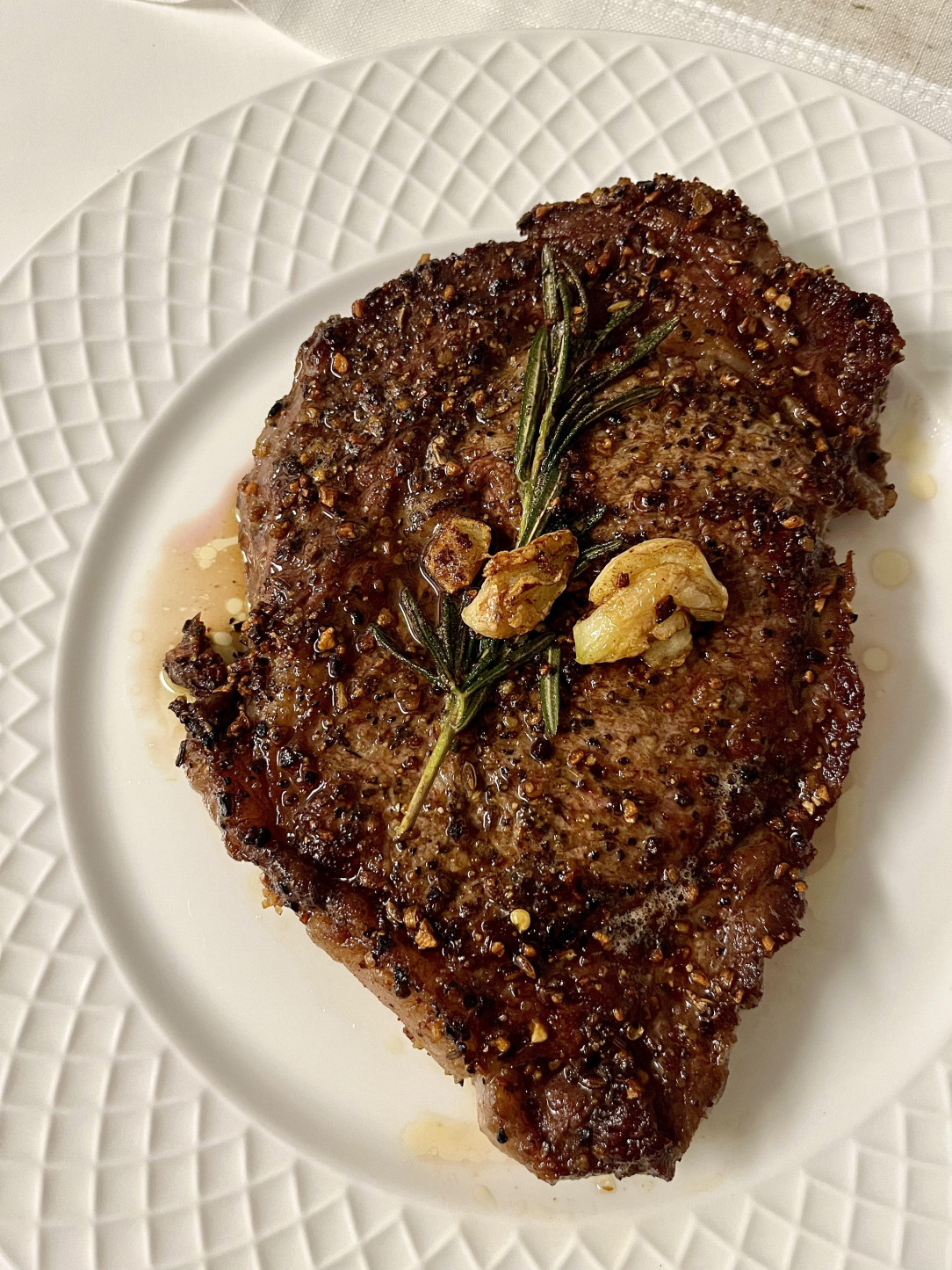 Seared ribeye basted with butter, rosemary and garlic