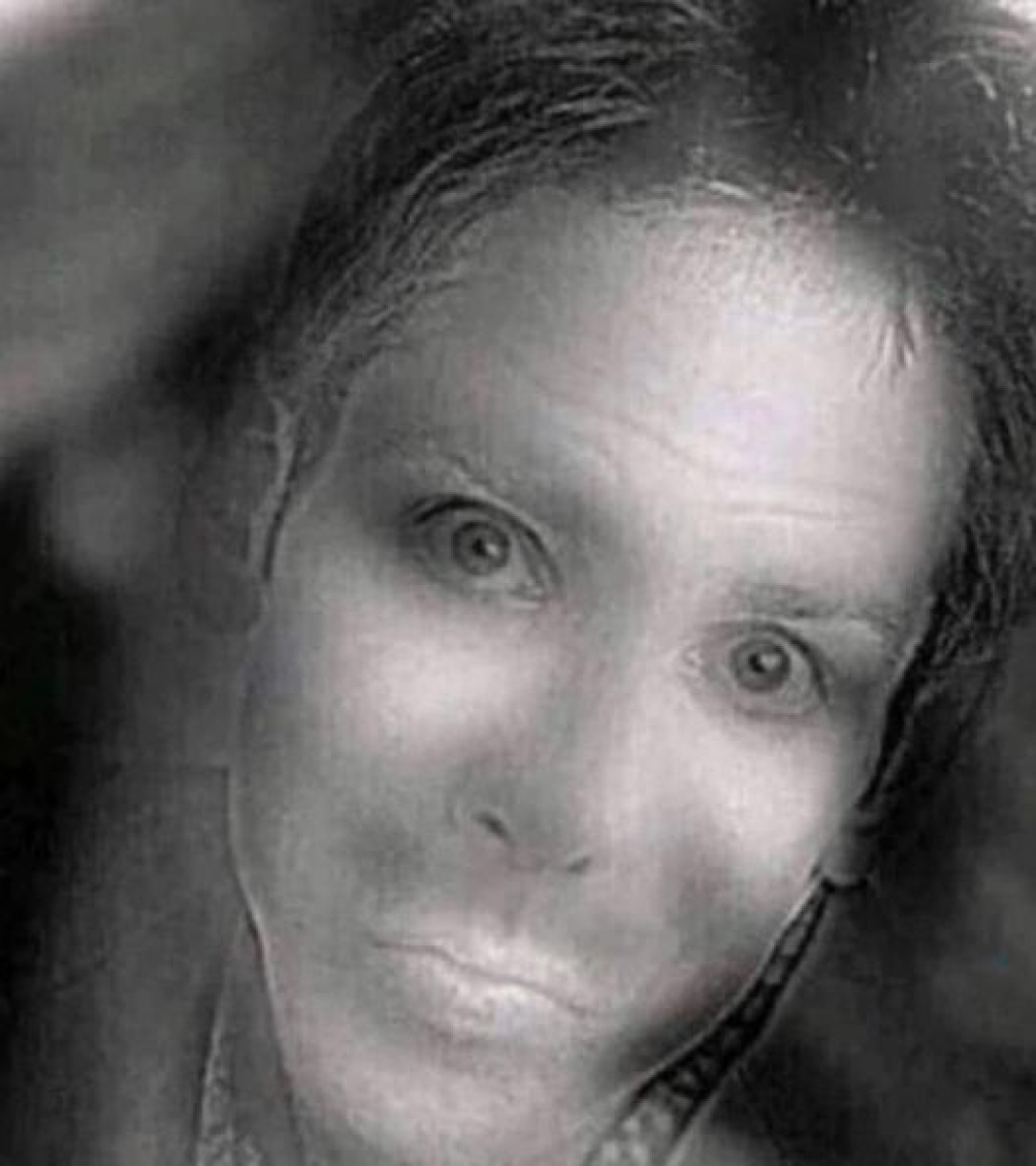 if you squint your eyes, you will see a smiling woman