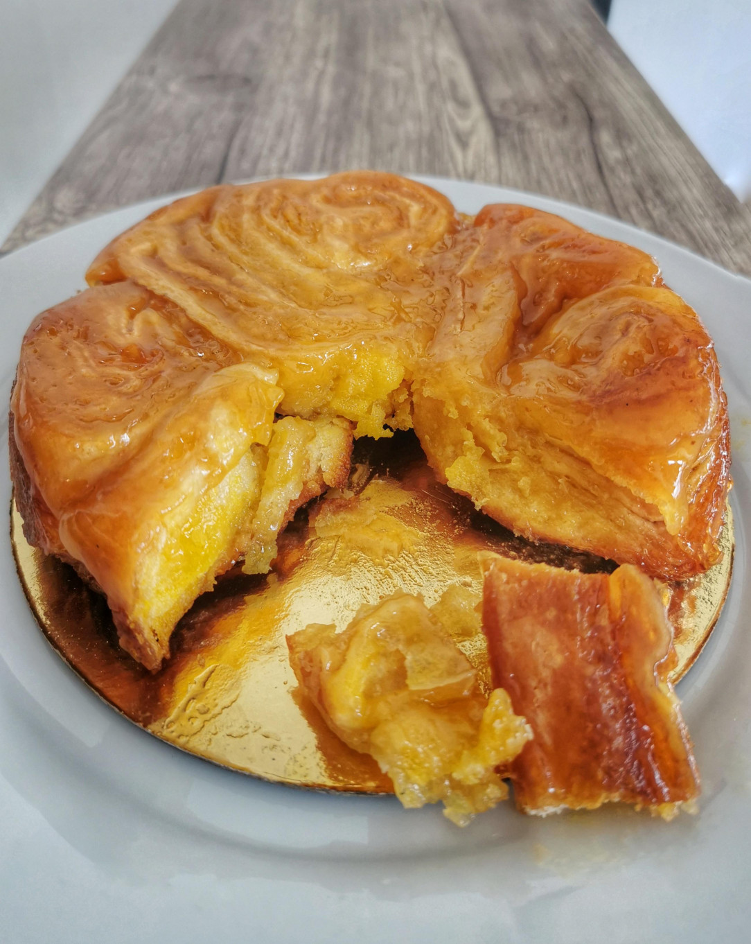 This is called a Kouign Amann. A French pastry that originates from the region of Brittany. The most buttery and sinful pastry in the world