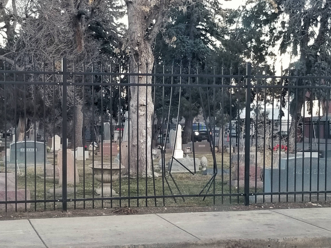 Not sure what broke out of the cemetery through a metal fence