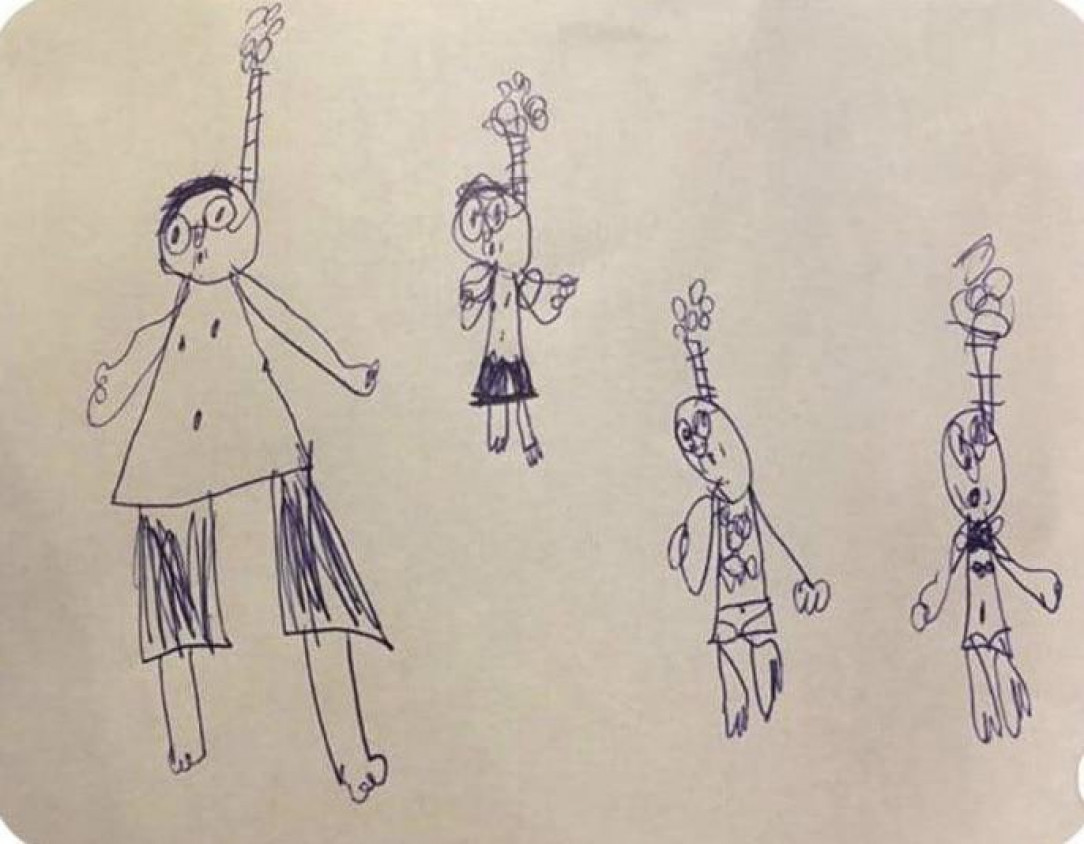 A 6 year old drew their family snorkeling