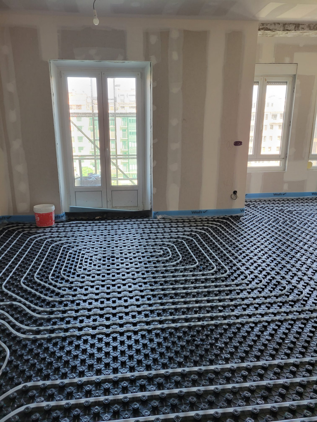 A friend of mine is having heated floors installed throughout her home