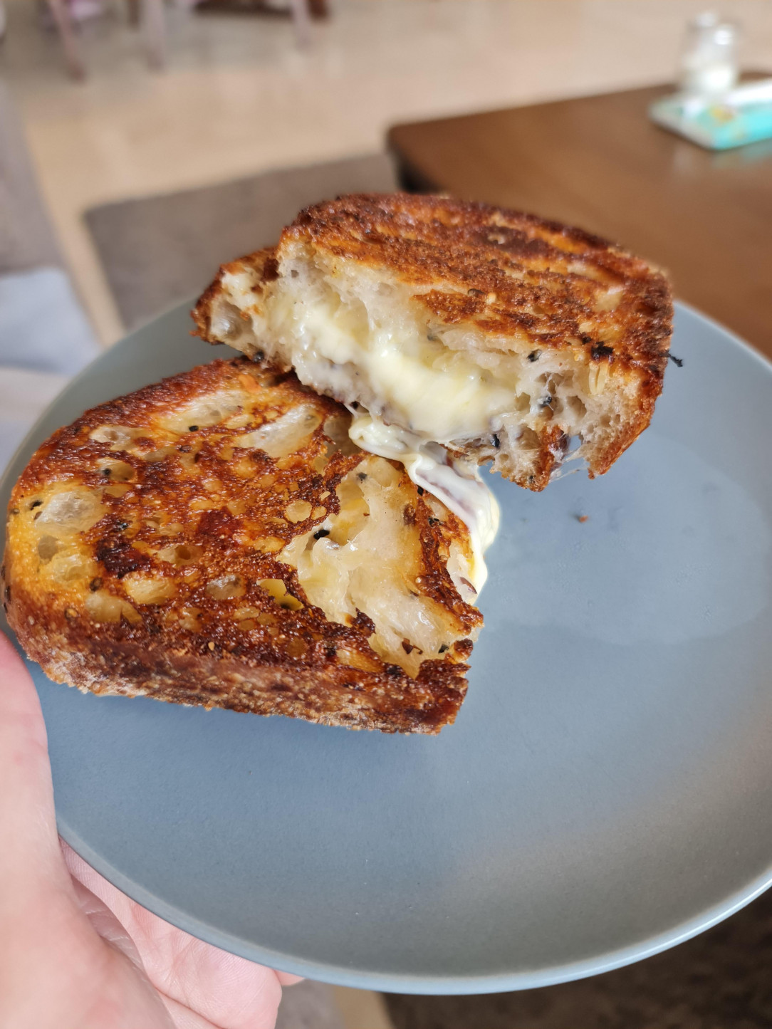 Grilled cheese sandwich with Gouda cheese on sourdough bread