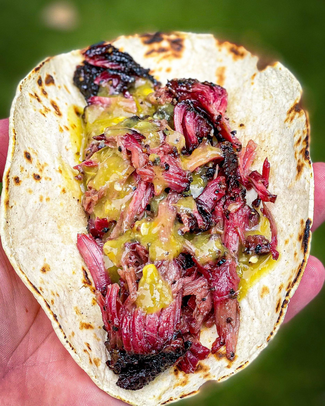 Smoked confit beef cheek tacos with garlic salsa verde