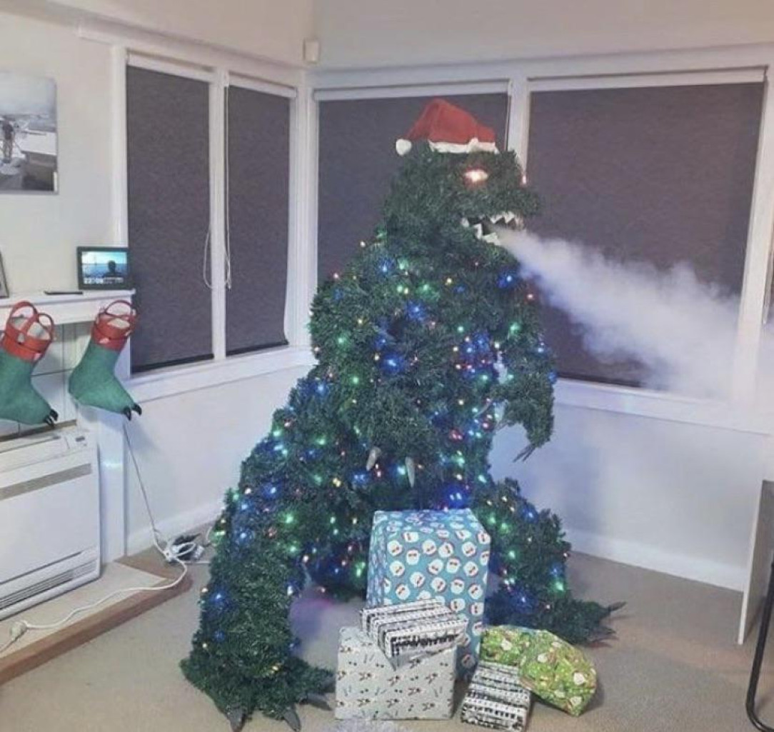 Hortigodzilla, ruler of the Christmas cheer (taken from r/blursedimages)