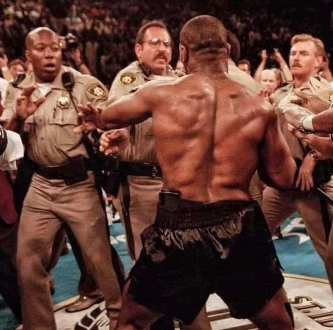 Las Vegas Police facing Mike Tyson after he&#039;d just bitten Evander Holyfield&#039;s ear off, 1996