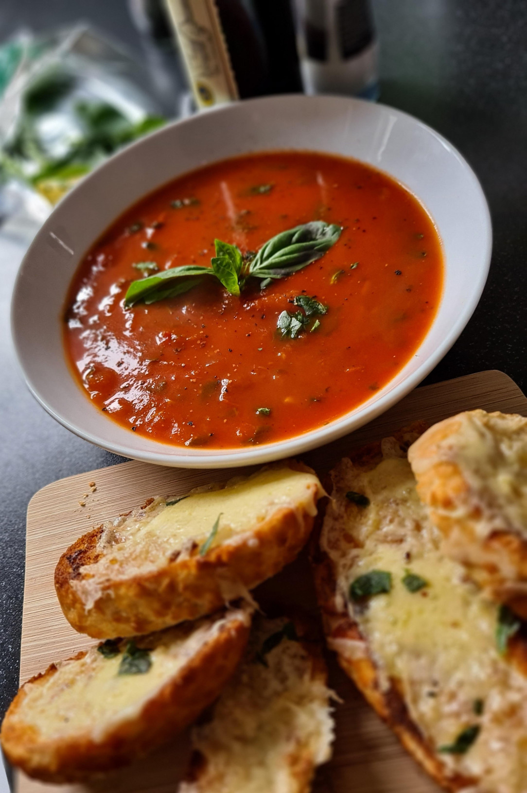 Tomato and basil soup with cheesy garlic bread