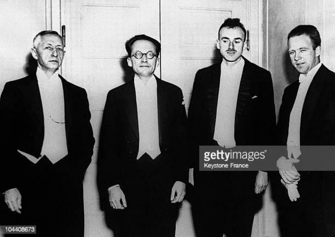 Schrodinger, Dirac, and Heisenberg at the Nobel ceremony