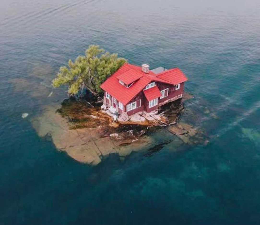 This island was renamed to Just Enough Room Island, for having just enough room for 1 house