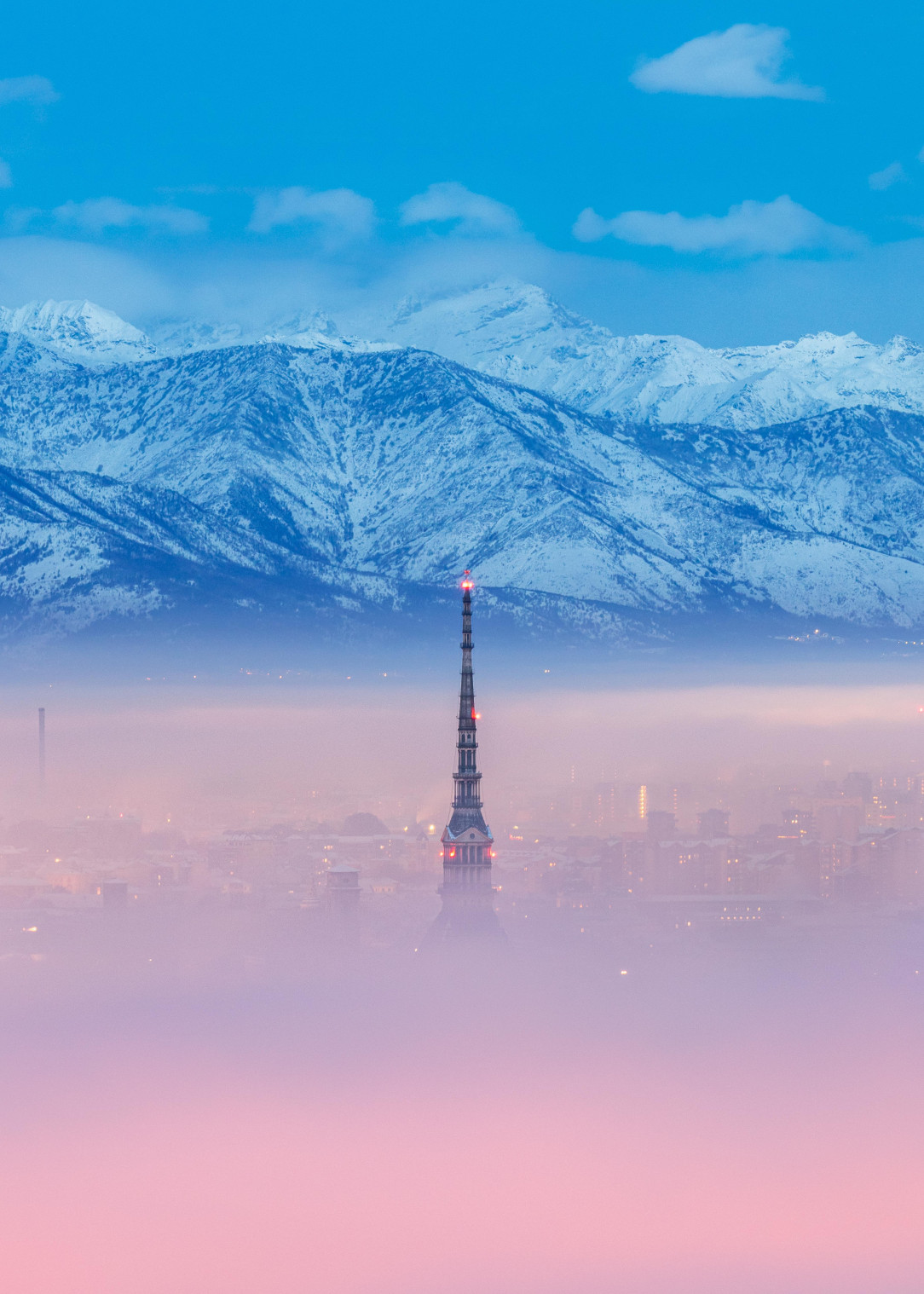 Turin&#039;s Mole Antonelliana poking out of the fog, Italy, December 2022
