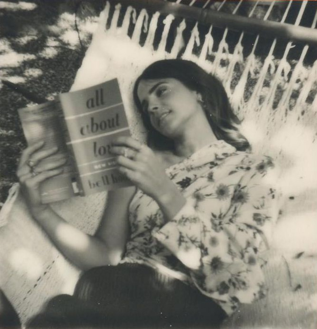 Reading a book, on a hammock