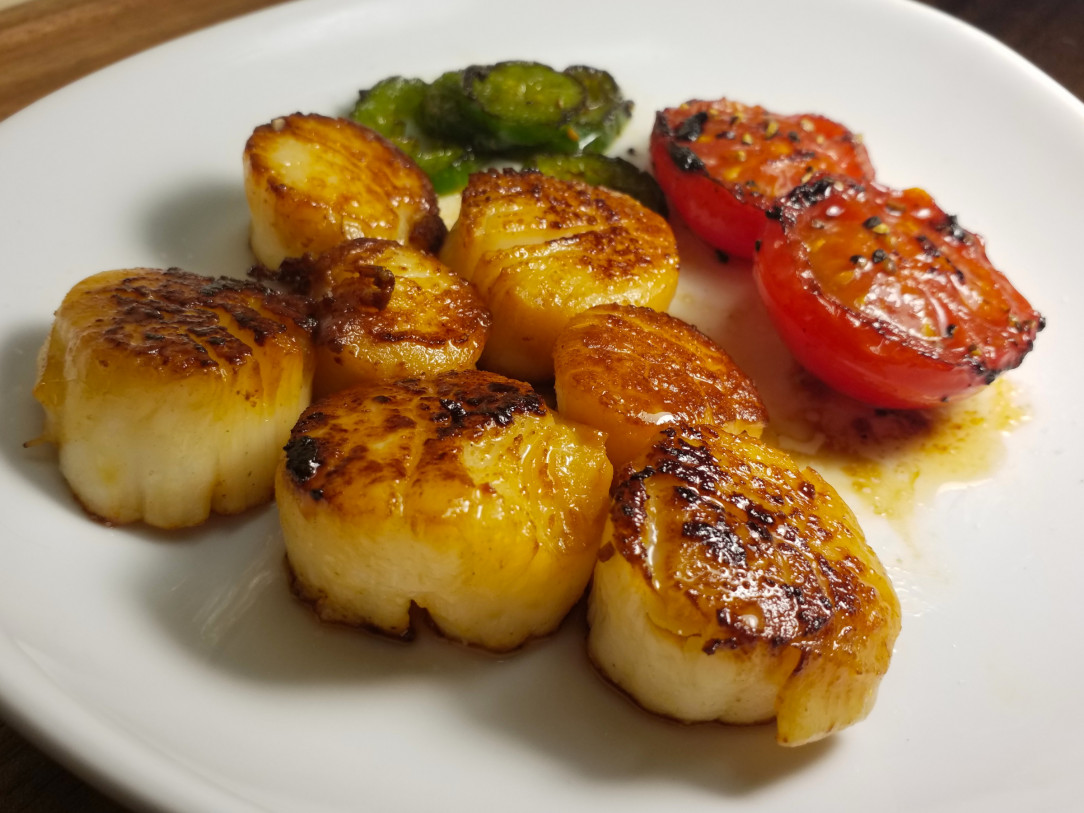 Scallops, Tomato and Jalapeño seared in tallow and braised in butter