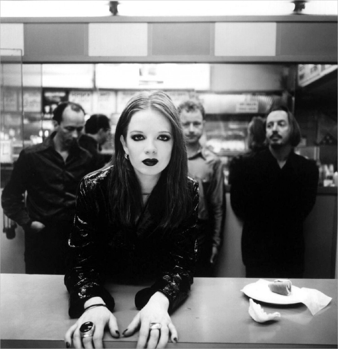 Shirley Manson, lead singer of Garbage, with her band (1995)