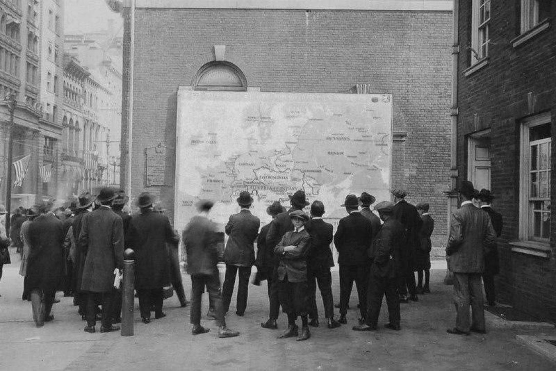 Passers-by study a new map of Europe after World War I, 1918