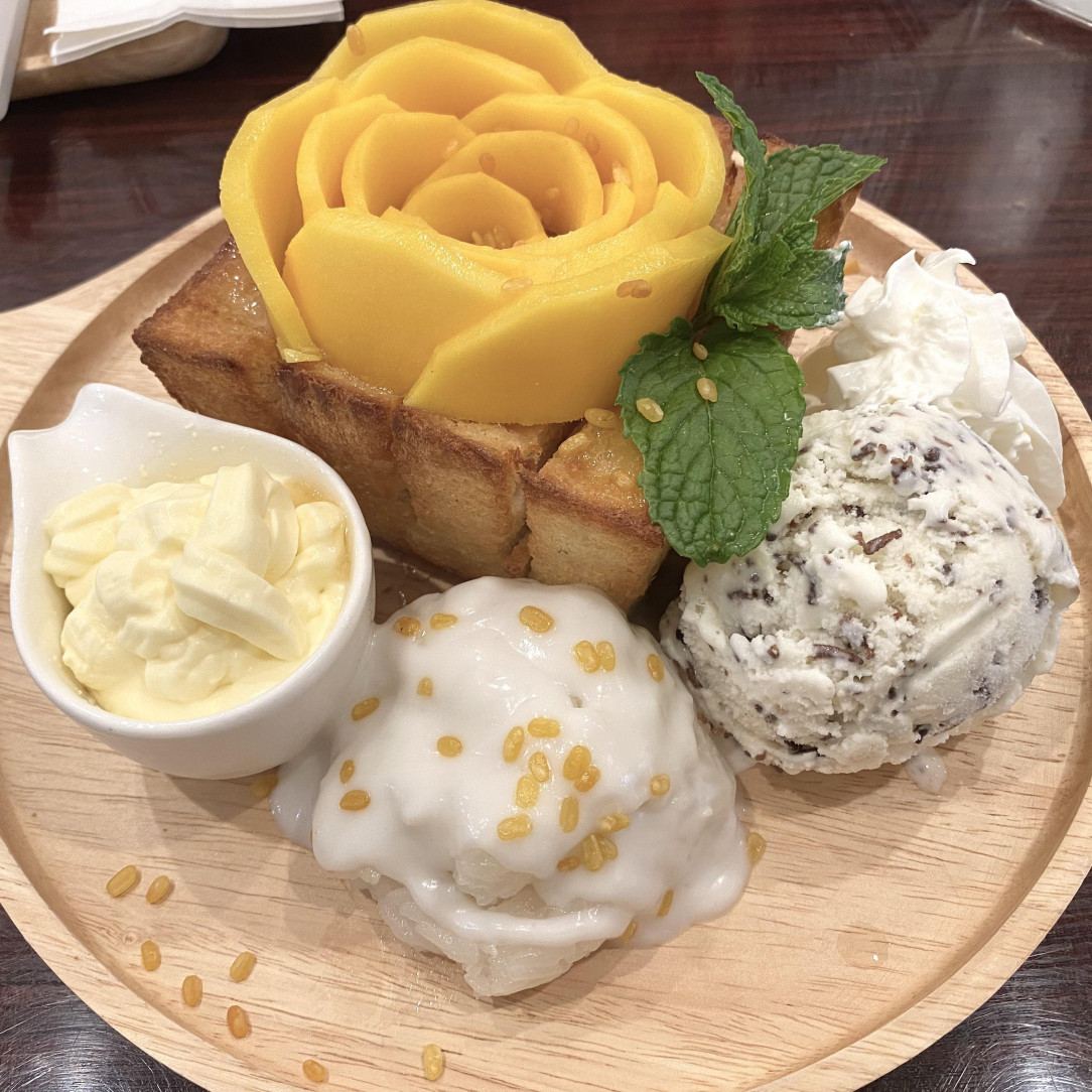 Mango sticky rice with coconut ice cream, mango creme, and crispy loft toast