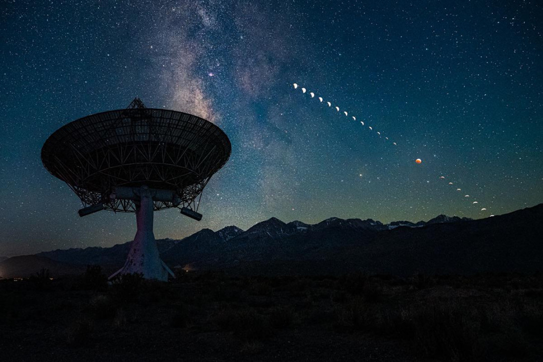 “Mid-Eclipse and Milky Way” by John Kraus