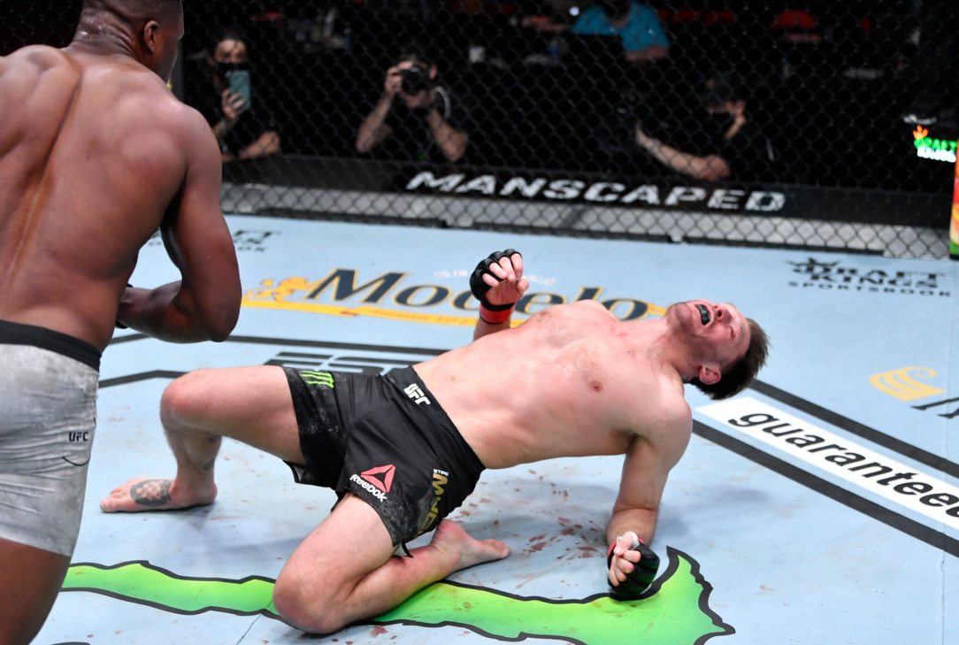 [UFC 260 SPOILER] Amazing photo of the end of the main event fight