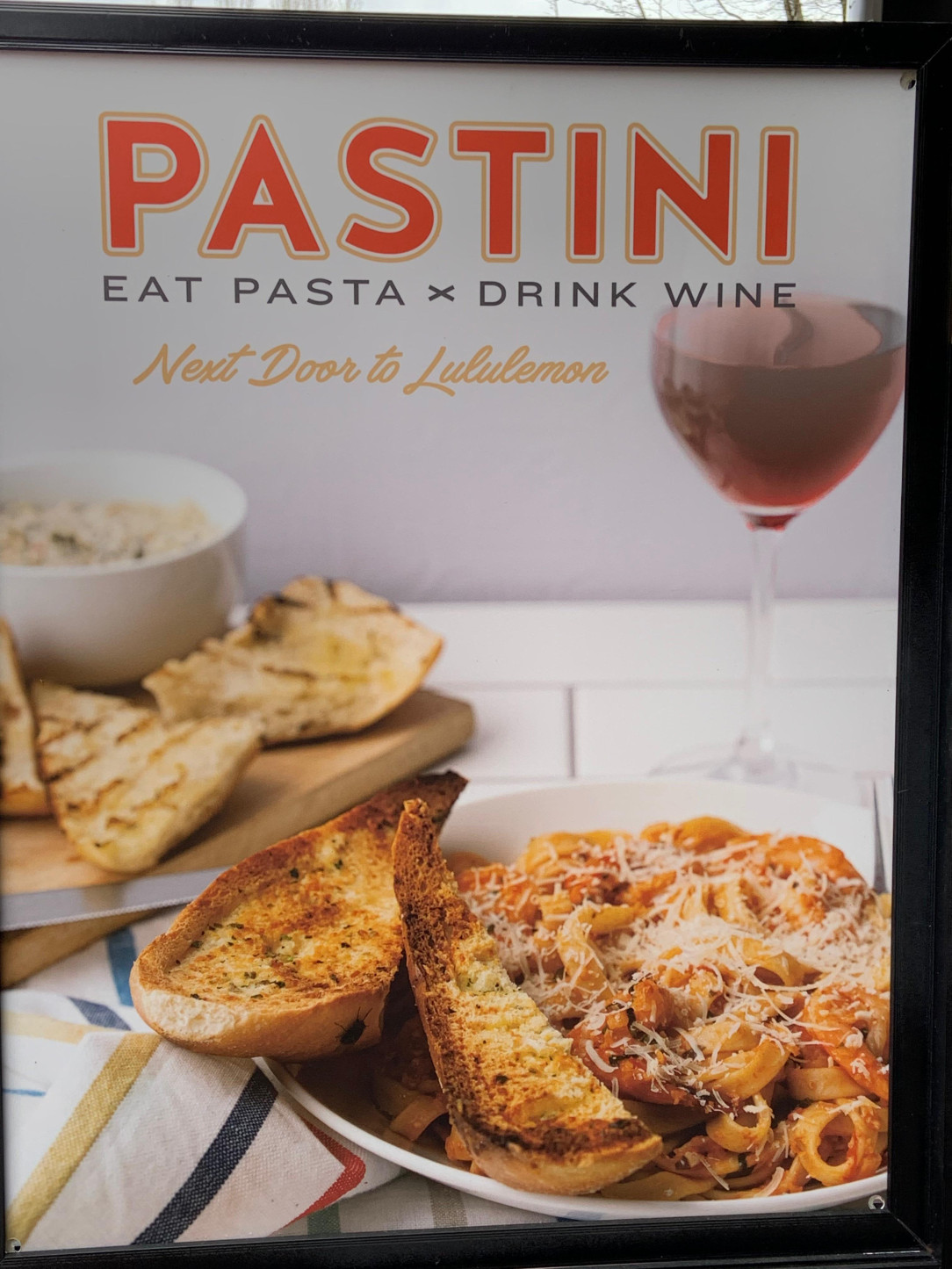 This Pastini advertisement’s picture has a fly on the garlic bread