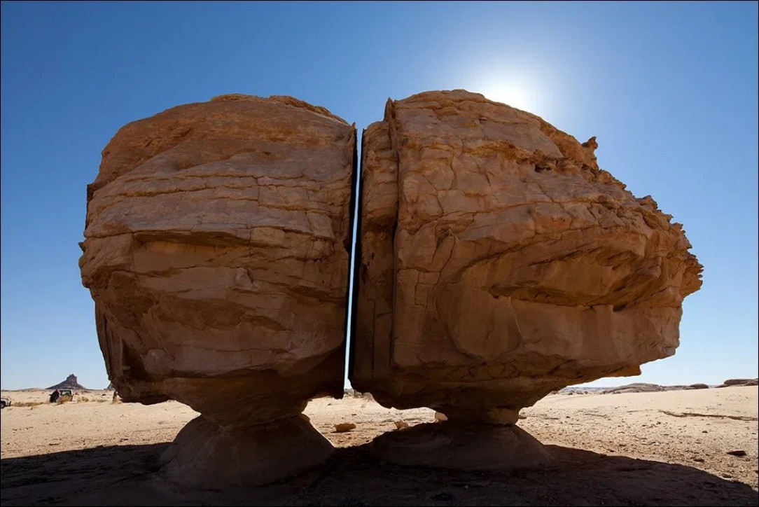 The Al Naslaa Rock Formation eroded a perfect cut through its center