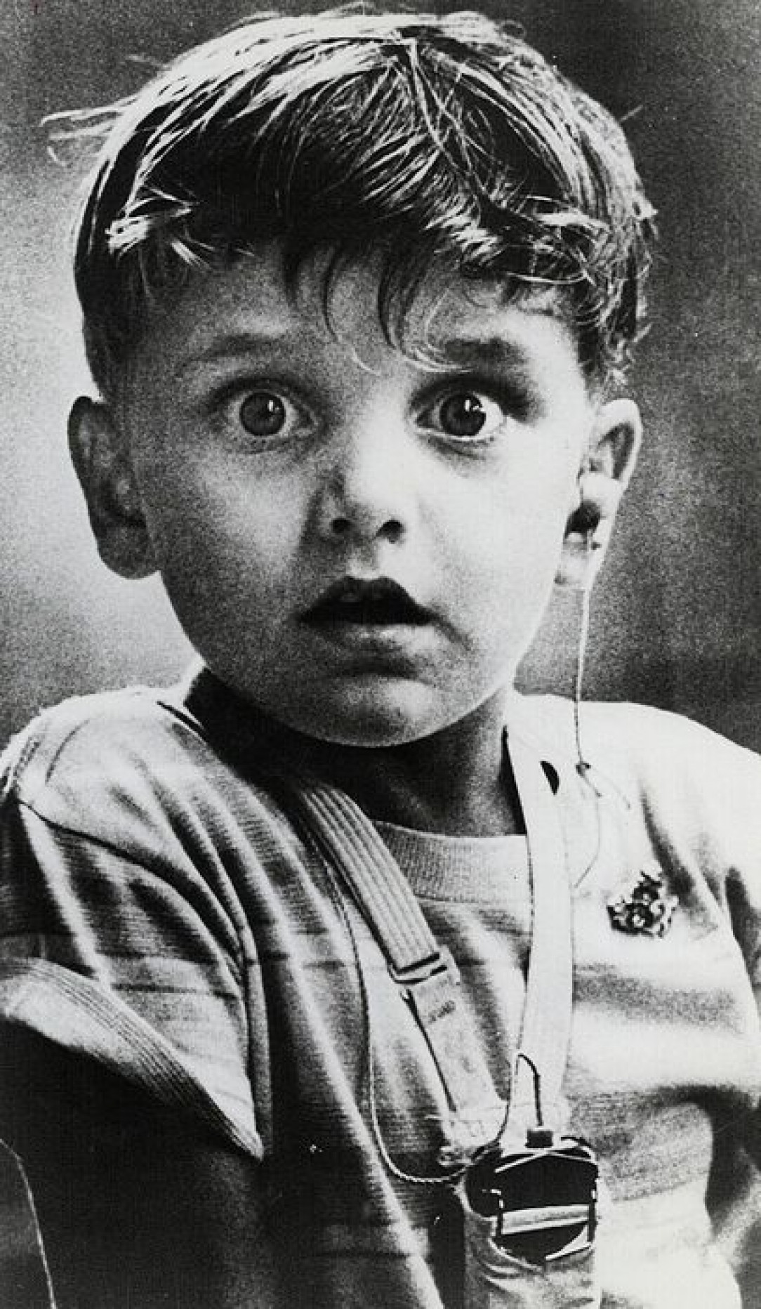 The exact moment when Harold Whittles, born deaf, hears for the first time after the placement of an earpiece