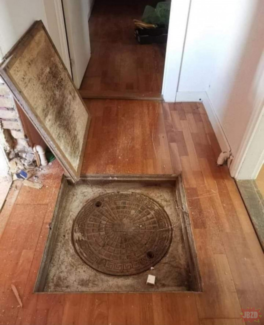 A manhole in the middle of the house