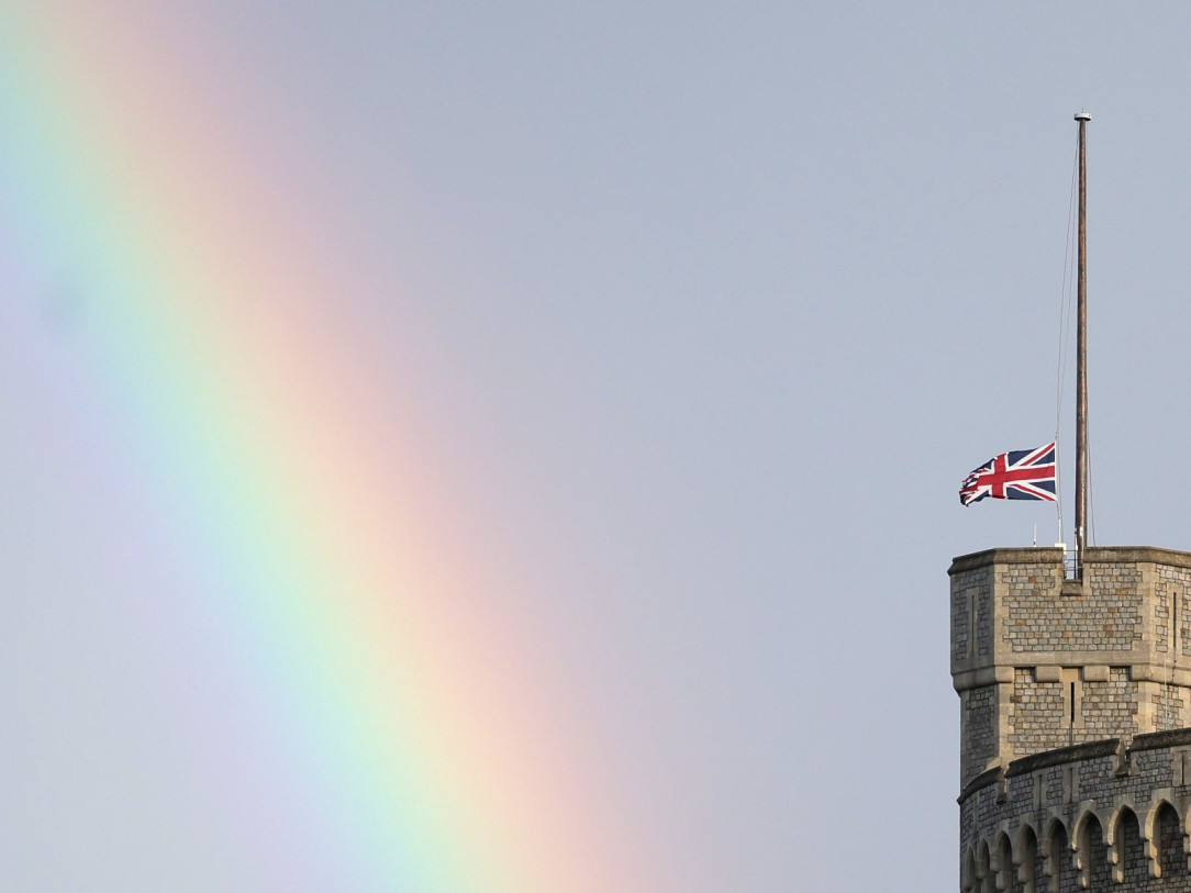 Rainbow next to the lowered Union flag atop Windsor Castle