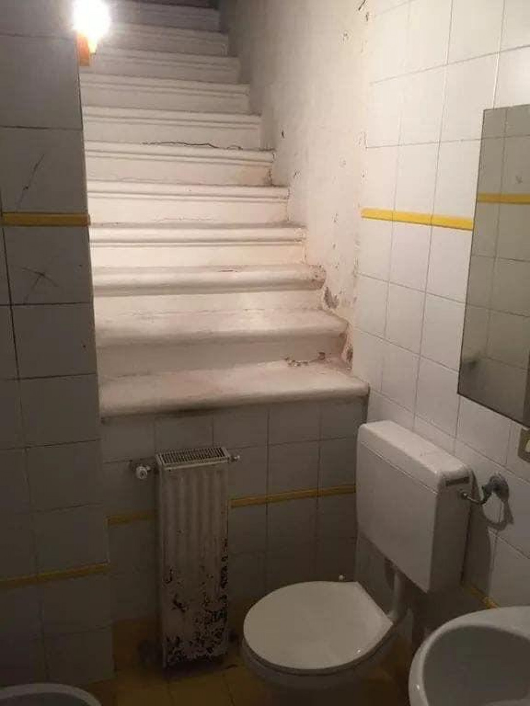 Stairs by toilet